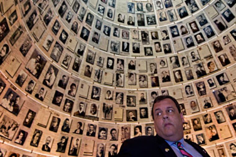 New Jersey Gov. Christie visited the Hall of Names at the Yad Vashem Holocaust Memorial museum in Jerusalem on Tuesday. Christie kicked off his first official overseas trip Monday, meeting Israel's prime minister and visiting the Western Wall. BERNAT ARMANGUE / AP