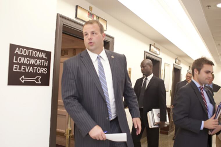 Rep. Jon Runyan (R., N.J.) heads off to a meeting of the House Committee on Natural Resources. (Ed Hille / Staff Photographer)