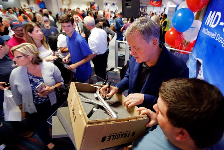 American Airlines CEO Doug Parker signed a model of an American MD-80 for Don Collins of Cleveland. In 2019, Collins flew to join the festivities associated with American's final MD-80 revenue flight, which departed DFW International Airport for Chicago. The airline was retiring its final four MD-80s, which had been in service since the 1980s.