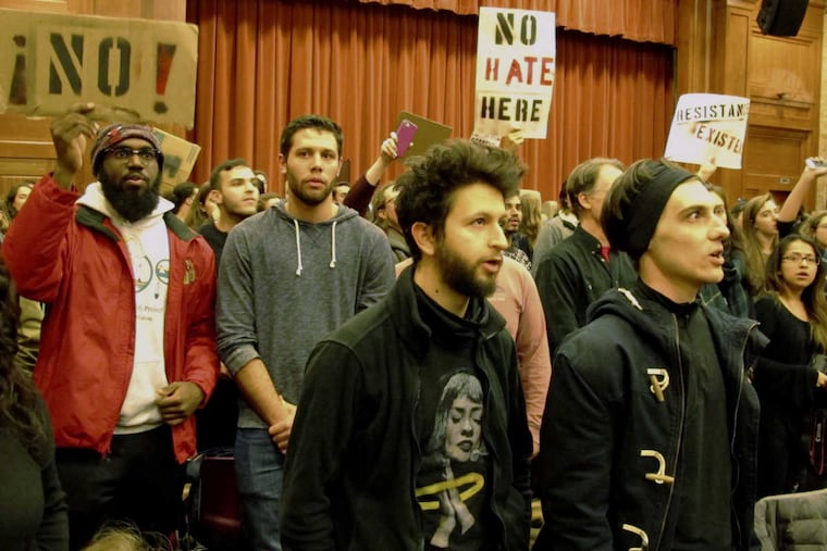 Middlebury College students protest a lecture by writer Charles Murray on March 2.