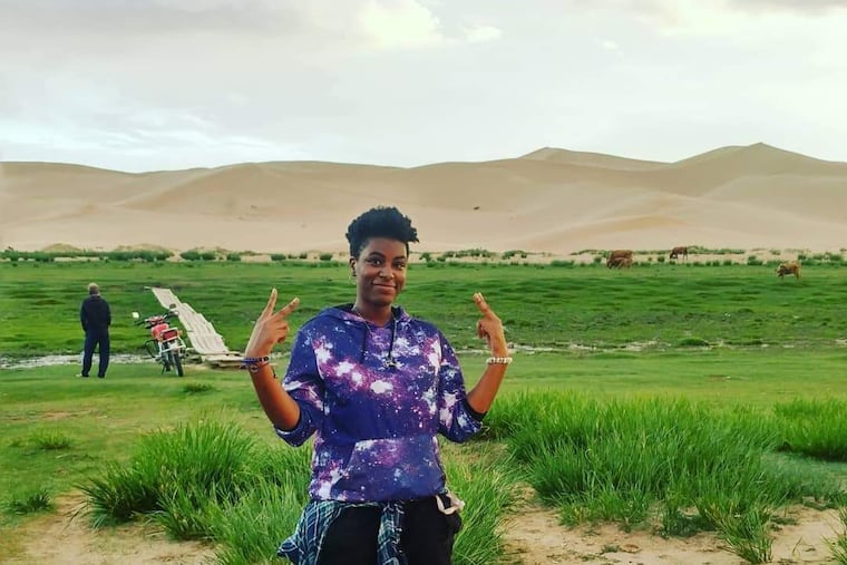 Kaelynn Williams, a Peace Corps volunteer, at the Khongoryn Els sand dunes, also known as the "Singing Dunes" in the Gobi Desert.