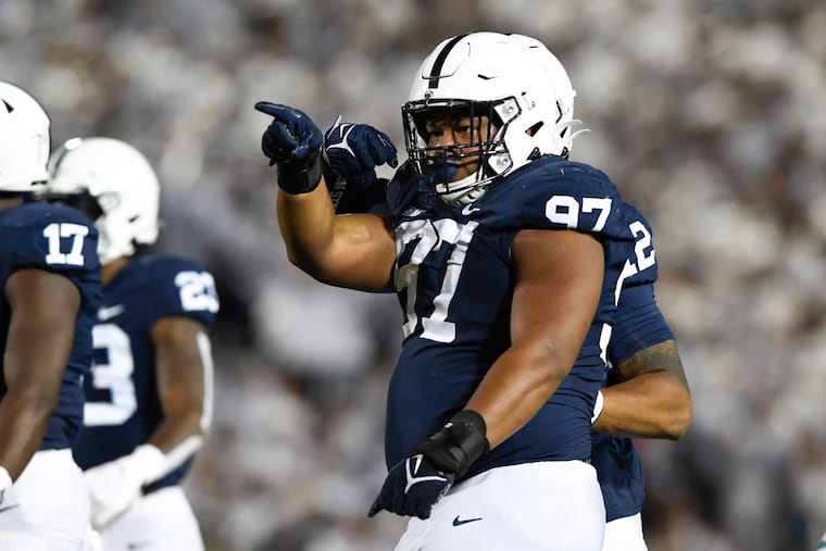 Penn State defensive tackle PJ Mustipher (97) has been creating havoc for opposing offenses.