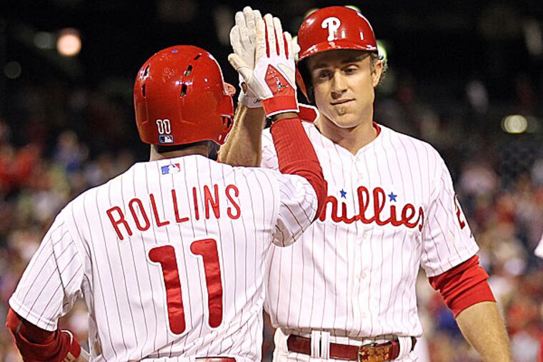 Phillies second baseman Chase Utley and shortstop Jimmy Rollins. (Yong Kim/Staff file photo)