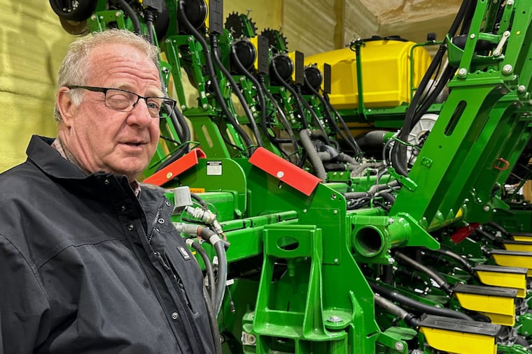 Tom Waters, a seventh-generation farmer, stands next to his planting machinery Friday, March 13, 2026, in Orrick, Mo.