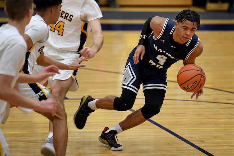 Malvern Prep's Deuce Turner handles the ball during the victory over Penn Charter. He recently became the school's all-time leading scorer.