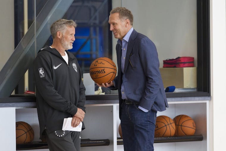 Philadelphia 76ers general manger Bryan Colangelo (right) and coach Brett Brown.