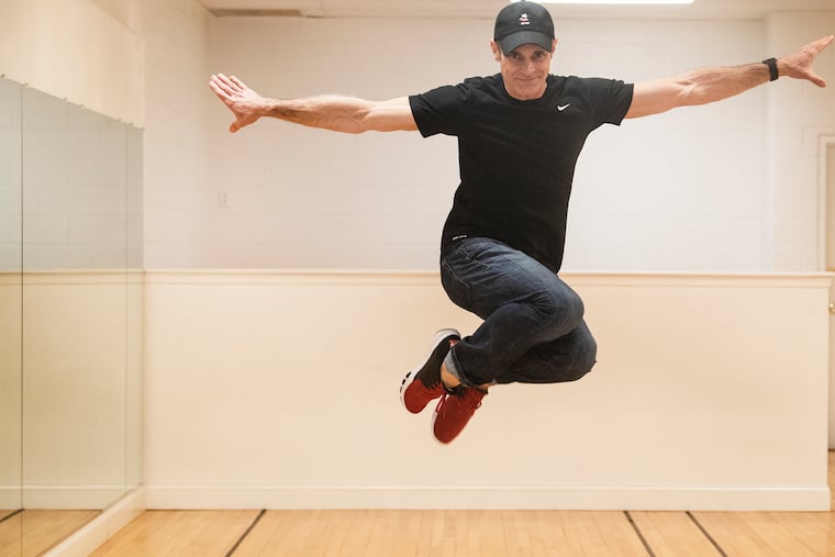 Sam Sinns, performs a dance move at Twirl dance studio in Newtown Square, Pa. Monday, March 15, 2021. Sinns left his job as a Disney performer in August 2016 and relocated his family from Florida to Pennsylvania to open Twirl, a dance studio in Newtown Square.