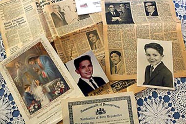 2008 file photo: Memorabilia of Anthony Tumolo on the dining room table of his sister, Joanie Hess (AP Photo/Rene Macura)