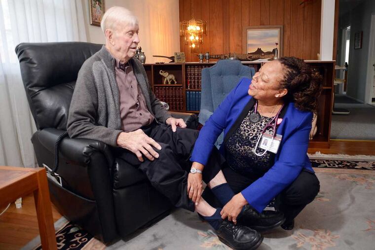 Nurse practitioner Janet Dunn (right) checks on the health of Oivind Midthassel of Southampton, Pennsylvania`Friday December 11, 2015 in Southampton, Pennsylvania.