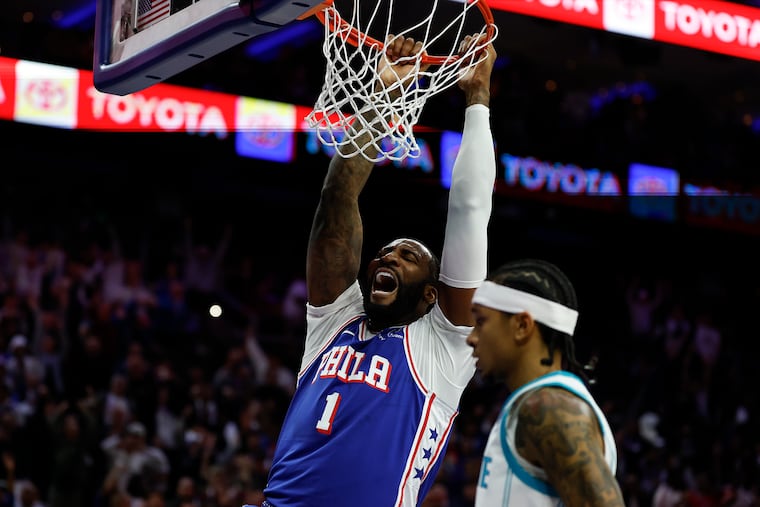 Sixers center Andre Drummond dunks against the Hornets on Saturday.