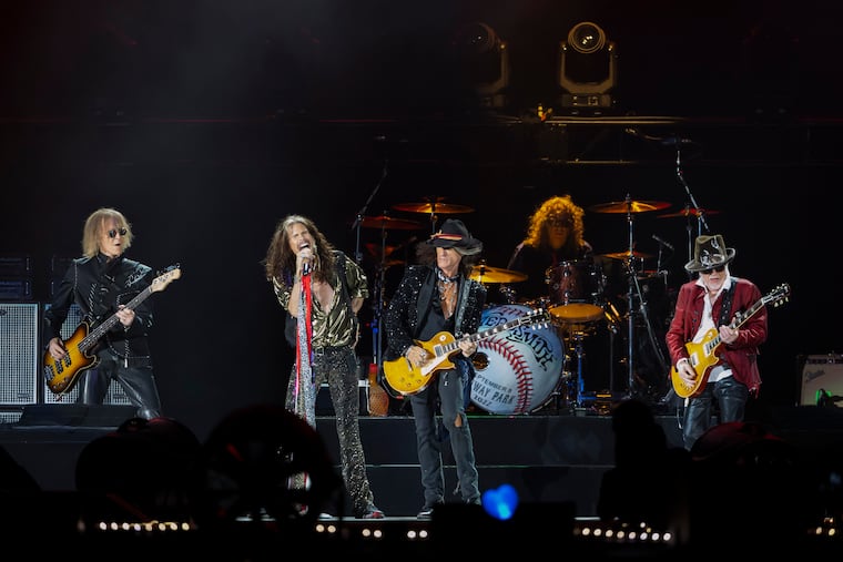 FILE - Tom Hamilton, from left, Steven Tyler, Joe Perry, John Douglas and Brad Whitford of Aerosmith, perform on Sept. 8, 2022, at Fenway Park in Boston. Aerosmith will be touring a city near you for the last time to celebrate their 50-plus years of being together. The Rock & Roll Hall of Fame band announced Monday, May 1, 2023 the dates for their farewell tour called “Peace Out” starting Sept. 2 in Philadelphia. (Photo by Winslow Townson/Invision/AP, file)