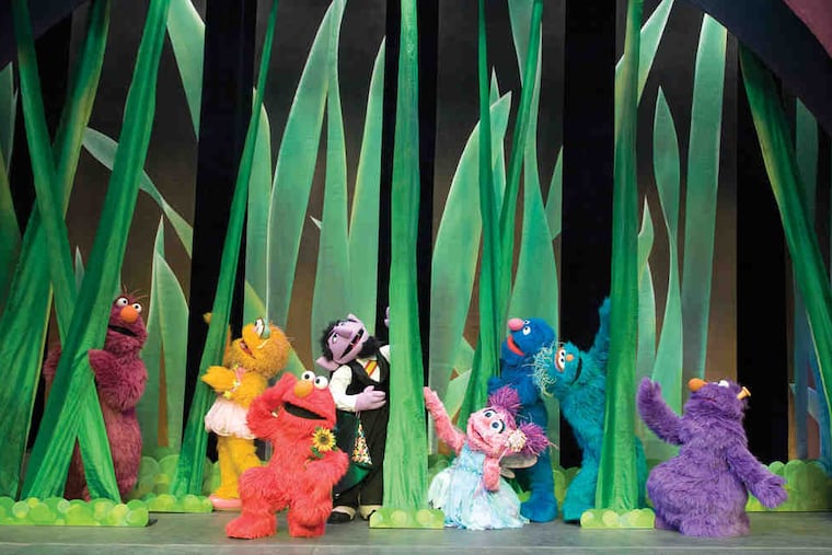 The gang goes green in "Sesame Street Live," playing through March 14. Dancing bugs and butterflies join the cast in Big Bird's garden, where Elmo and his pals have been accidentally shrunk by an impatient fairy.