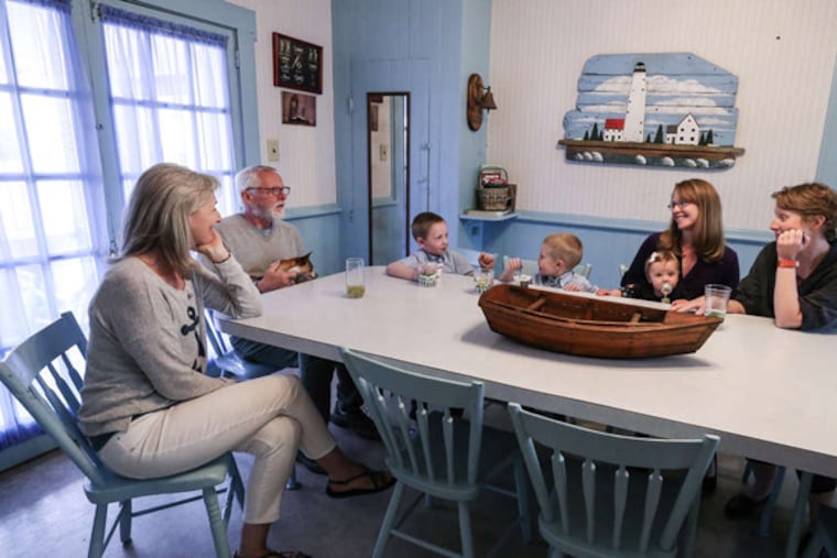 The Ship Bottom house has room for the whole family — a selling point for the Baldts. (From left) Beth and Rick Baldt; Owen and Colin LaGrou; Jessica Baldt LaGrou and daughter Fiona; and Erika Baldt. (STEVEN M. FALK/Staff Photographer)