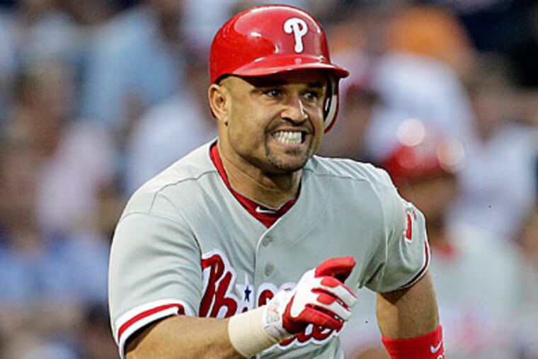 Placido Polanco was at the plate when the Phillies' eventual winning run scored off a wild pitch. (David Goldman/AP)