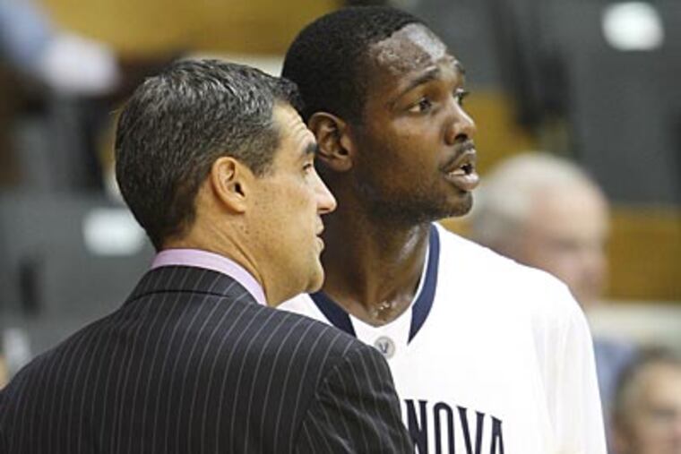 Villanova head coach Jay Wright talks with JayVaughn Pinkston while playing Carleton during the second half at the Pavilion in Radnor, Pa., Thursday, November 1, 2012. Villanova wins 65-59. (Steven M. Falk/Staff Photographer)