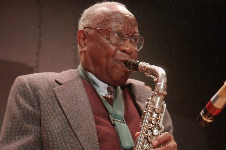 Mr. Williams plays at a jazz jam session in 2005. Playing the sax and engaging with young people were his passions.