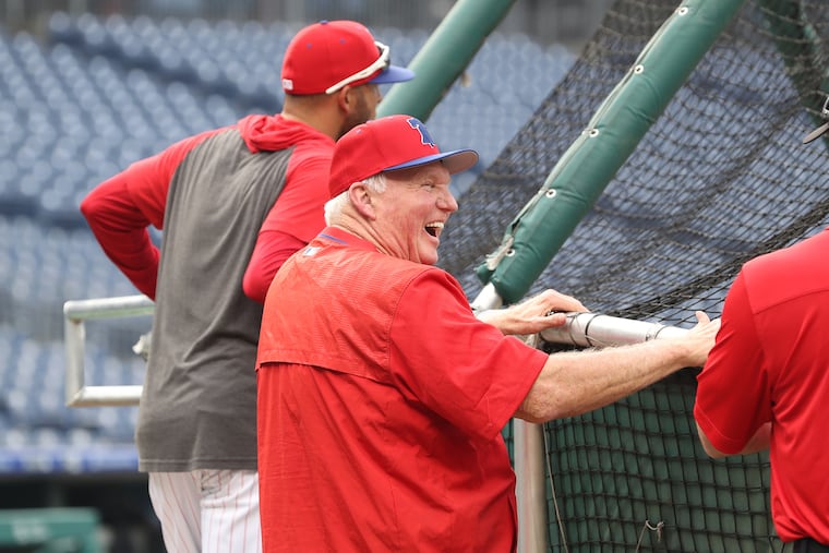 The Phillies fired their hitting coach John Mallee, hired former manager, Charlie Manuel, to replace him. Maunel, center, has a laugh during batting practice at Citizens Bank Park on Aug. 14, 2019.