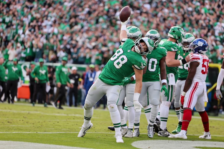 Eagles tight end Dallas Goedert spikes the ball after one of his two touchdowns Sunday against the Giants.