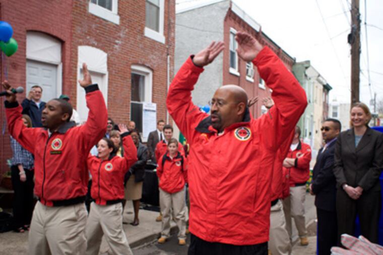 City Year volunteers have had success mentoring students. The program has made a positive impact for many but could use more funding. (Ed Hille / Staff Photographer)