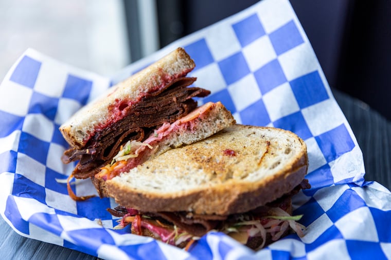 A vegan reuben made with vegan corned beef with swiss, carrot sauerkraut, beet dressing on rye bread, from Algorithm Grill in South Philadelphia, Pa., on Wednesday, April 5, 2023.