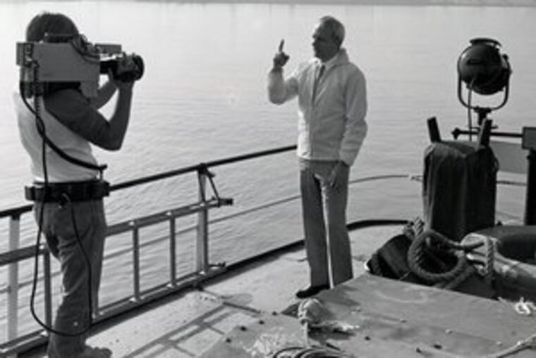 "Pat" Polillo (right) presenting an editorial on the declining port of Philadelphia in 1982. He wanted KYW editorials to "get things done."