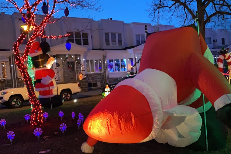 Santa has some issues on an otherwise flawless Christmas display on Smedley Street in South Philadelphia.