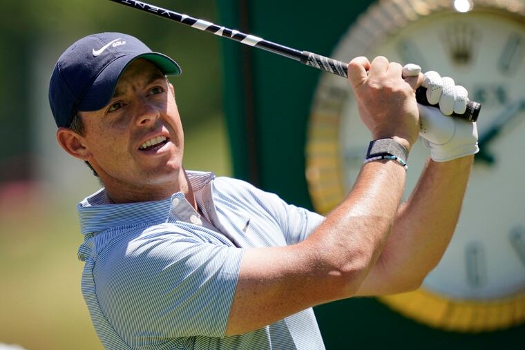 Rory McIlroy of Northern Ireland hits a drive on the 13th hole at The Country Club, site of the U.S. Open in Brookline, Mass.