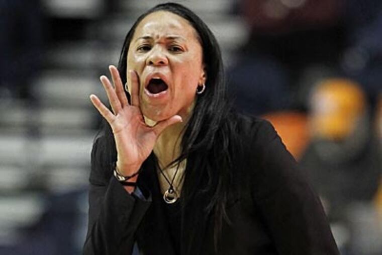 Dawn Staley grew up with Title IX. After playing professionally, she went on to become a coach. (Mark Humphrey/AP file photo)