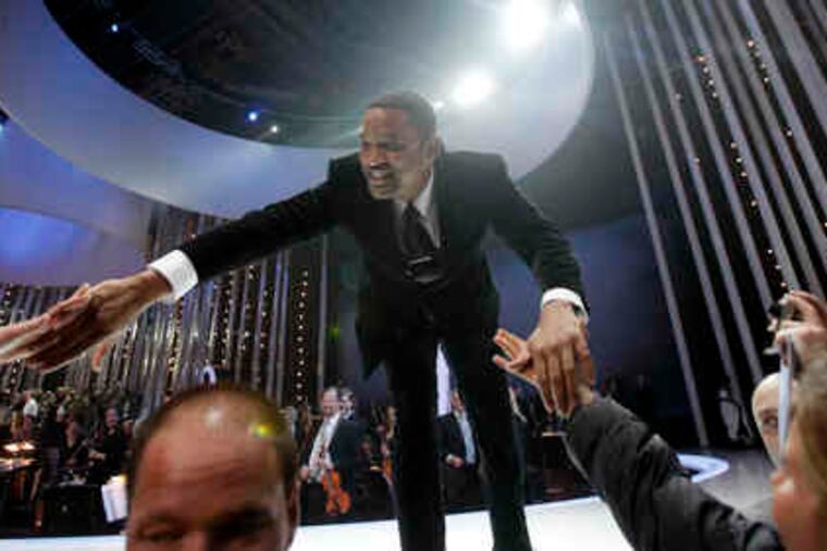 Will Smith, a long way from West Philly, greets crowd members at the conclusion of the Nobel Peace concert in Oslo, Norway, on Dec. 11. Artists from all over the world gathered at the Oslo Spektrum to help celebrate this year's laureate, President Obama.