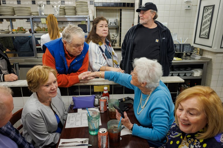 Former State Sen. Vincent Fumo shakes hands with former District Attorney Lynne Abraham at the Election Day lunch at the Famous 4th Street Deli.