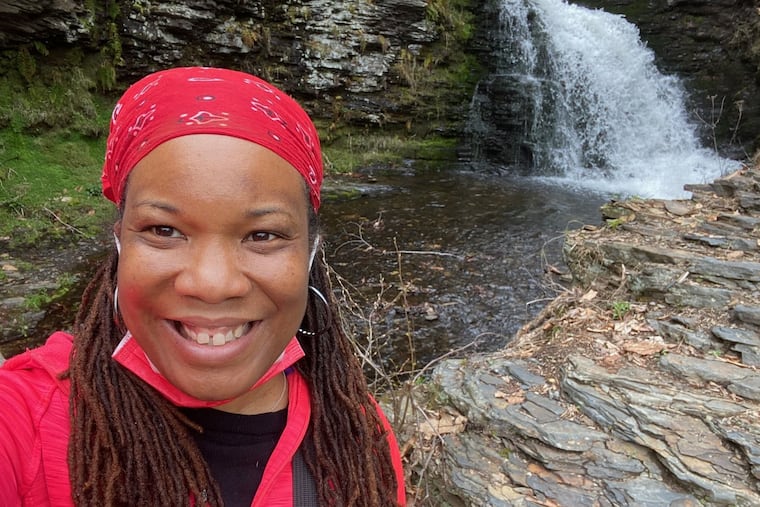 A selfie of Elizabeth Wellington enjoying the waterfalls at Bushkill Falls in Bushkill, PA