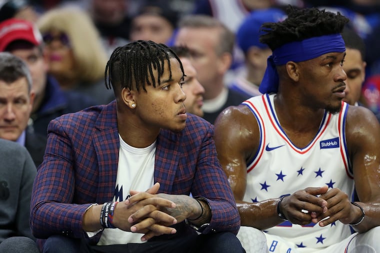 Markelle Fultz watches a January game at the Wells Fargo Center.