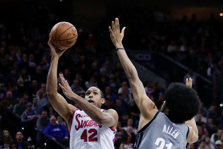 Sixers forward Al Horford shoots the basketball against Brooklyn Nets center Jarrett Allen on Thursday, February 20, 2020 in Philadelphia.