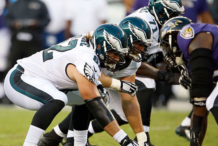 Jason Kelce prepares to snap the football against the Ravens.