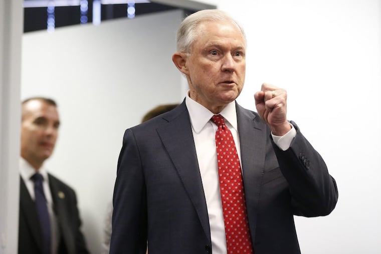 Attorney General Jeff Sessions speaks at the U.S. Attorney’s Office in Philadelphia in July. Attorney General Jeff Sessions speaks at Fraternal Order of Police convention earlier this week in Nashville, Tenn. Philadelphia is now suing him over restrictions aimed at its sanctuary-city policies.