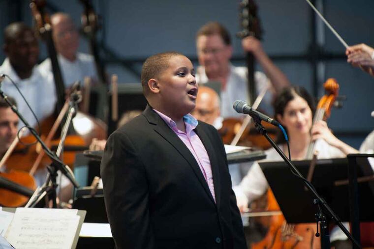 Soprano Bobby Hill — who gained fame during Pope Francis’ visit — sings during a free concert offered by the Philadelphia Orchestra at Penn’s Landing on Friday night.