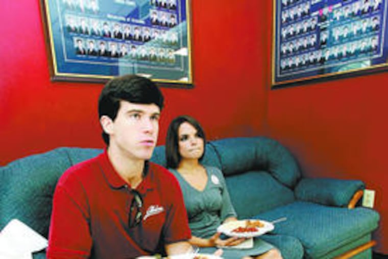 Daniel Weaver, president of Lambda Sigma Phi, a Christian fratat the University of Alabama, with his friend Amanda Lacey.