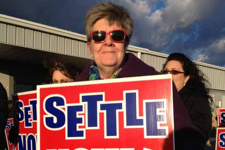 Dolores Morris, a speech therapist, marched with about 150 other members of the Washington Township Education Association outside a school board meeting last week. (Photo by Andrew Seidman)