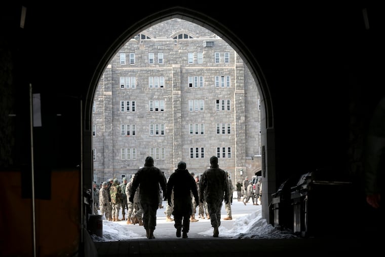 FILE — Cadets head for formation at the United States Military Academy in West Point N.Y., Feb. 12, 2014. Dr. Adam Kalkstein is suing the U. S. Military Academy, where he was a professor of geography and the only climate scientist, after being fired. (Suzanne DeChillo/The New York Times)