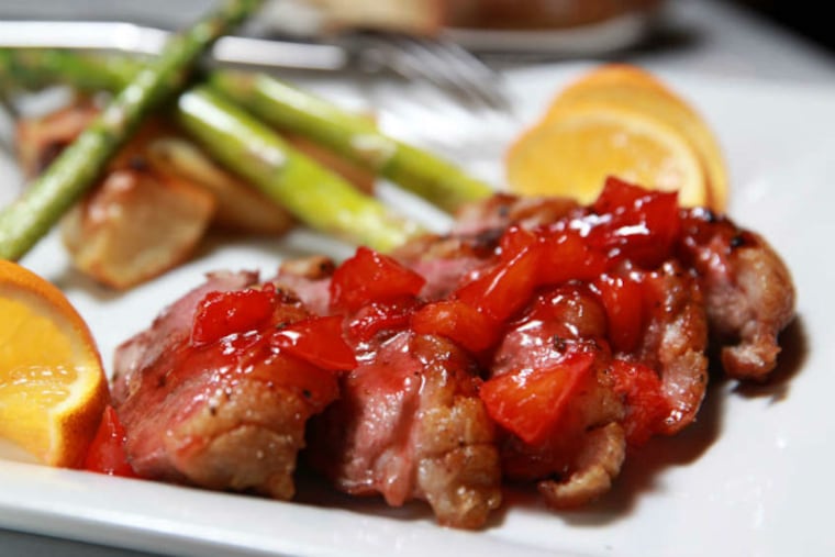 A duck entrée is among the offerings at Gran Caffe L'Aquila.