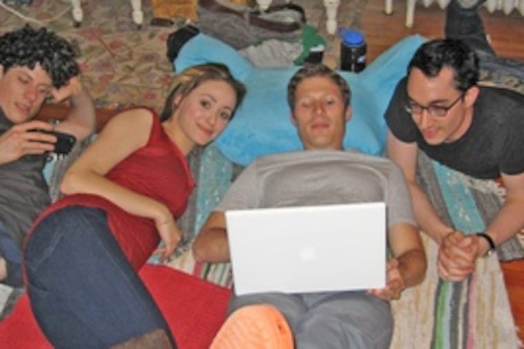 On the set of "dare," a high-school-genre flick filmed here, actors (from left) Ashley Springer, Emmy Rossum and Zach Gilford stretch out between takes with the project's auteur, David Brind, a Society Hill native.