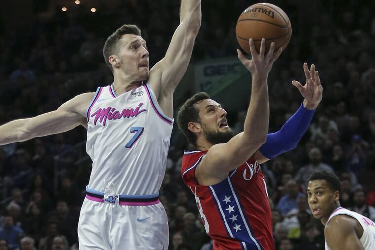 Marco Belinelli (right) was picked up by the Sixers after the trade deadline.