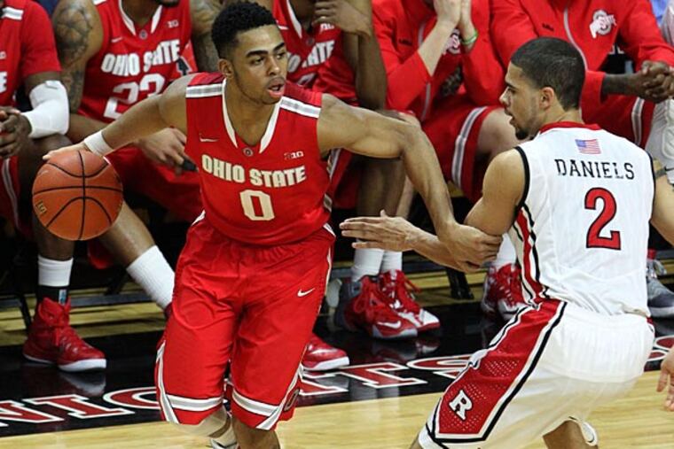 Rutgers Scarlet Knights guard Bishop Daniels (2) defends against Ohio State Buckeyes guard D'Angelo Russell (0) during second half at Louis Brown Athletic Center. (Noah K. Murray/USA Today)