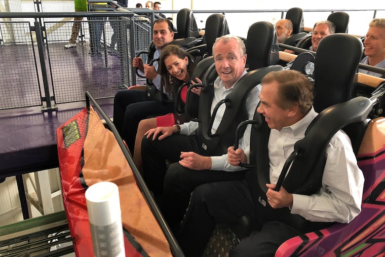 New Jersey Gov. Phil Murphy prepares to ride a roller coaster inside the Nickelodeon amusement park at American Dream in East Rutherford last October. On Wednesday, he gave indoor amusement parks permission to reopen on Sept. 1.