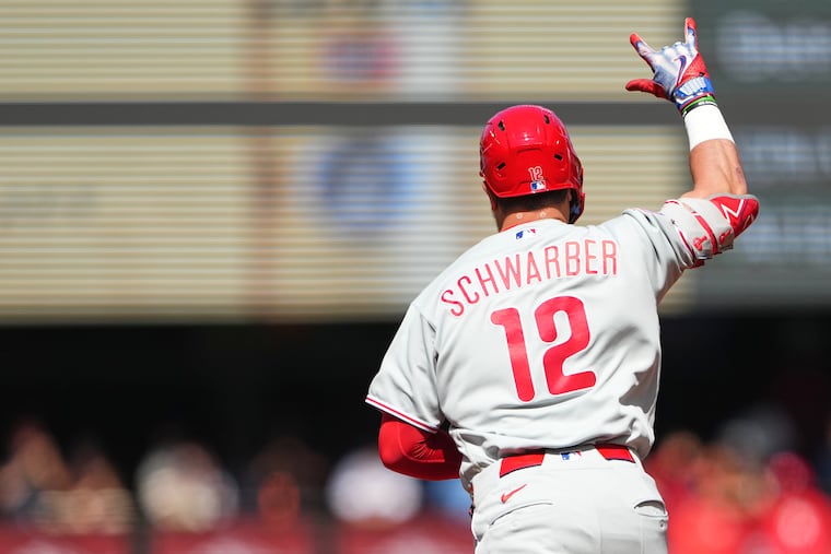 The Phillies' Kyle Schwarber jogs the bases after hitting a three-run home run against Mariners during the second inning on Wednesday in Seattle.
