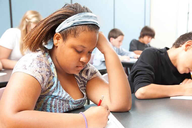 Testing critics spur the school district to send home packets about how parents can opt their children out of assessments.