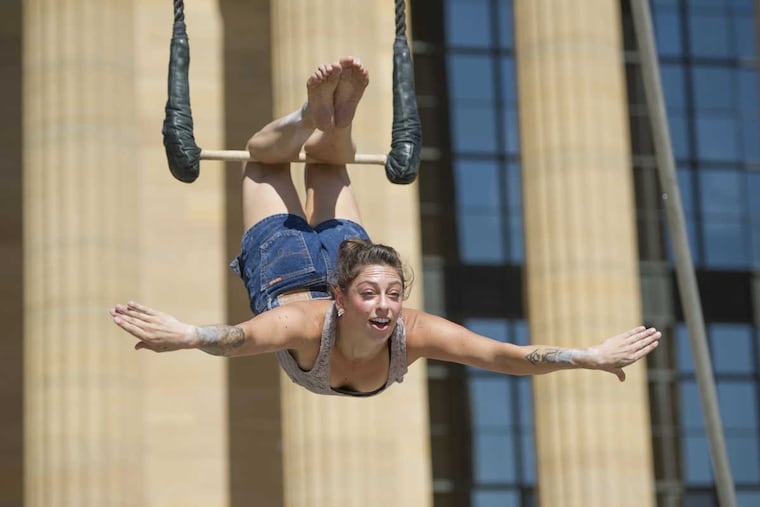 Nicole “Cole” Burgio performs on a trapeze. Burgio said she began gymnastics as a toddler, and performs at festivals and on cruise ships.