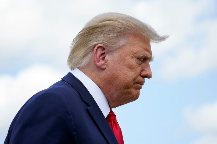 turns after speaking to reporters before boarding Air Force One for a trip to Jupiter, Fla., to speak about the environment, Tuesday, Sept. 8, 2020, at Andrews Air Force Base, Md. He will also travel to a campaign rally in North Carolina. (AP Photo/Evan Vucci)