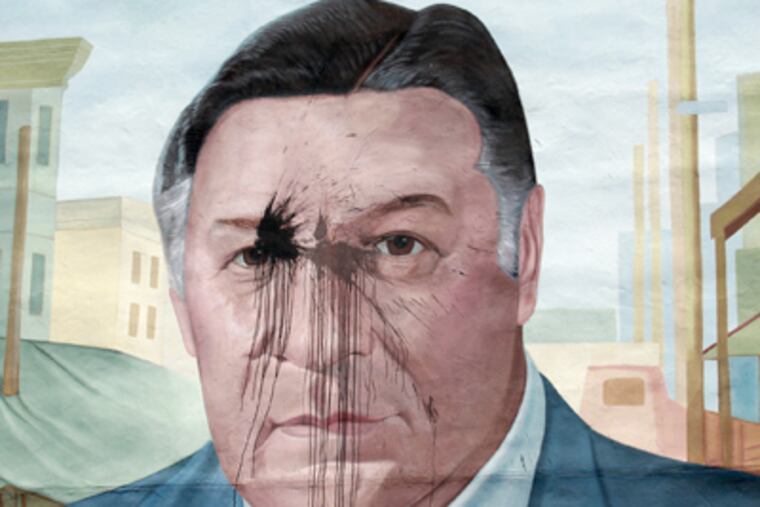 The vandalized mural of former Philadelphia Mayor and Police Commissioner Frank Rizzo at the Italian Market area in South Philadelphia on Sunday, July 1. ( Yong Kim / Staff Photographer)