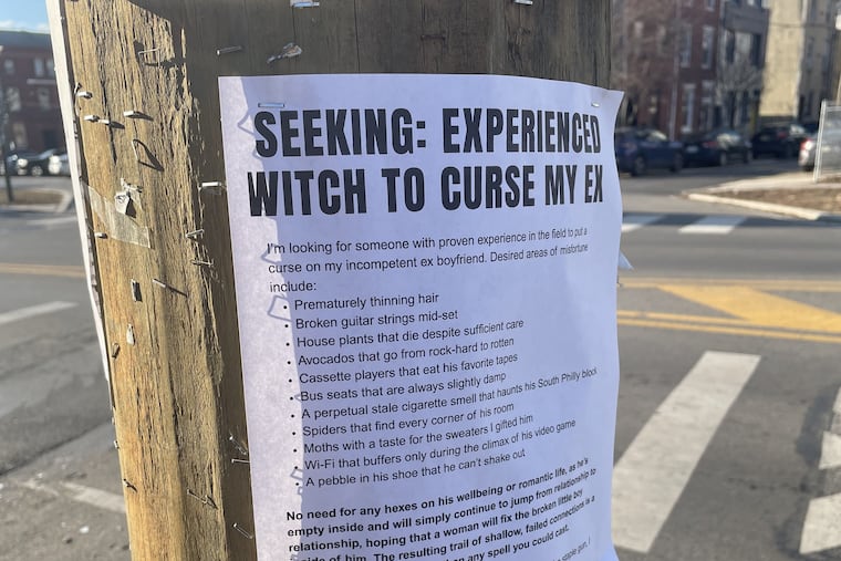 One of the witch-seeker's flyers hangs in Fishtown on Sunday, Jan. 4. After ending a two-year relationship and confronting her anger and frustration, a Philadelphia woman posted flyers around the city and in Phoenixville as a way to channel her emotions over the breakup.
